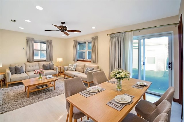 dining room featuring ceiling fan and light hardwood / wood-style floors