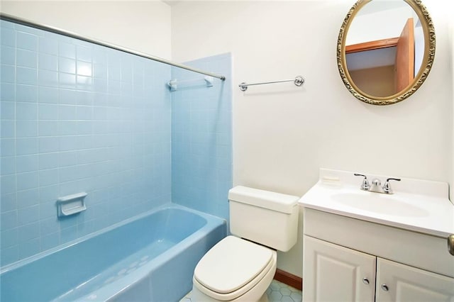 full bathroom with vanity, toilet, and tiled shower / bath combo