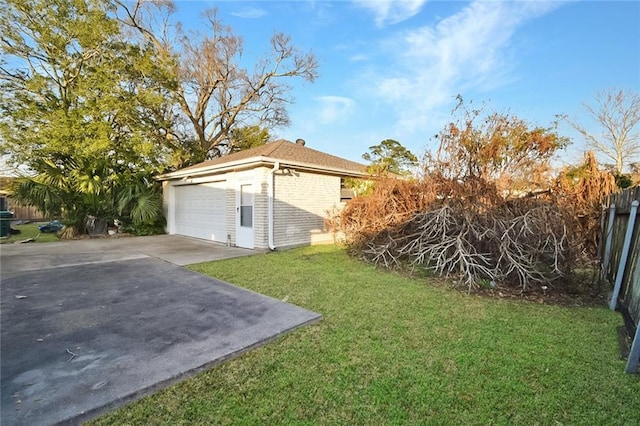 view of yard with a garage and an outdoor structure