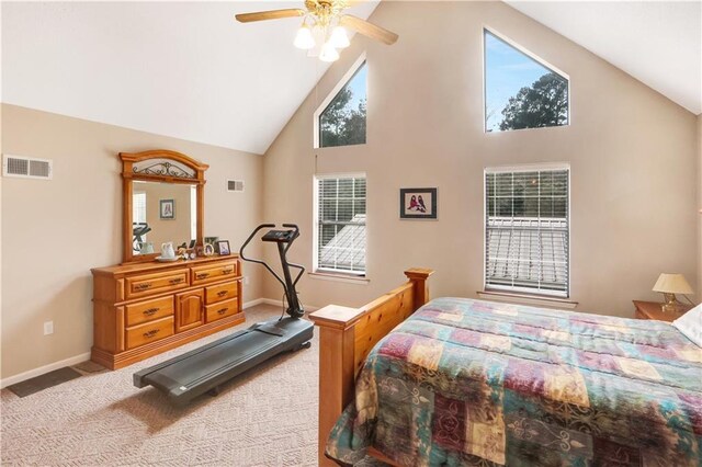 bedroom with multiple windows, carpet floors, high vaulted ceiling, and ceiling fan