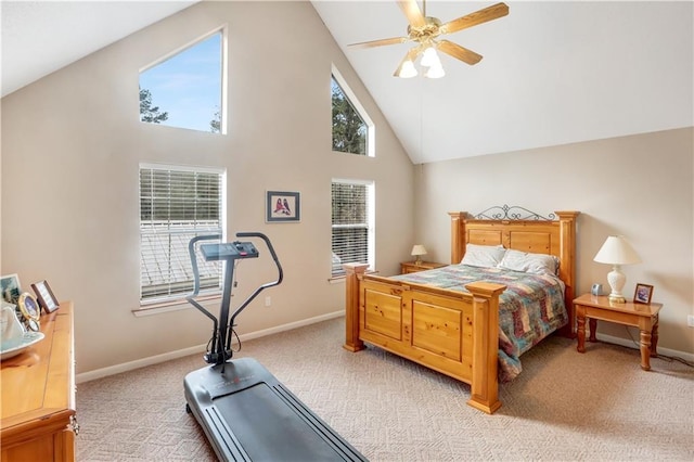 bedroom with light carpet, high vaulted ceiling, and ceiling fan