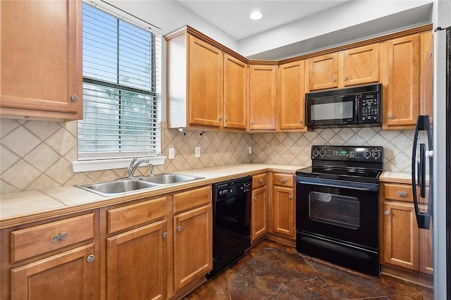 kitchen with sink, backsplash, and black appliances