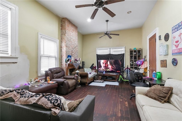 living room with dark hardwood / wood-style floors and ceiling fan