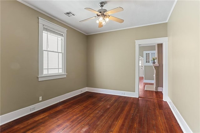 empty room featuring crown molding, ceiling fan, and dark hardwood / wood-style flooring