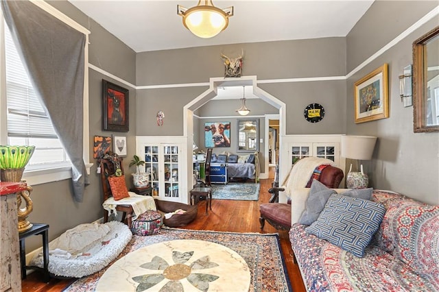 living room featuring wood-type flooring and french doors