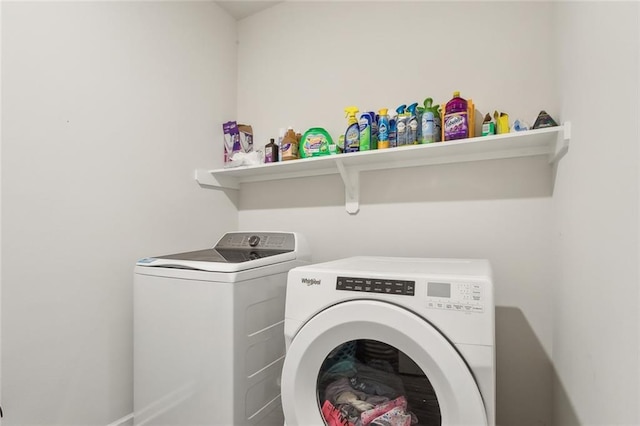 laundry area featuring washing machine and dryer