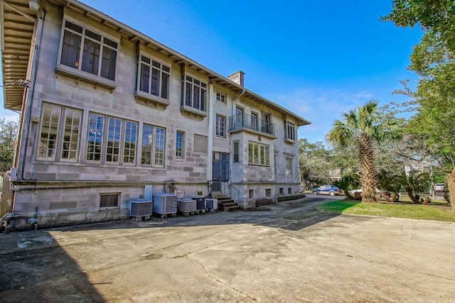 view of property with central air condition unit