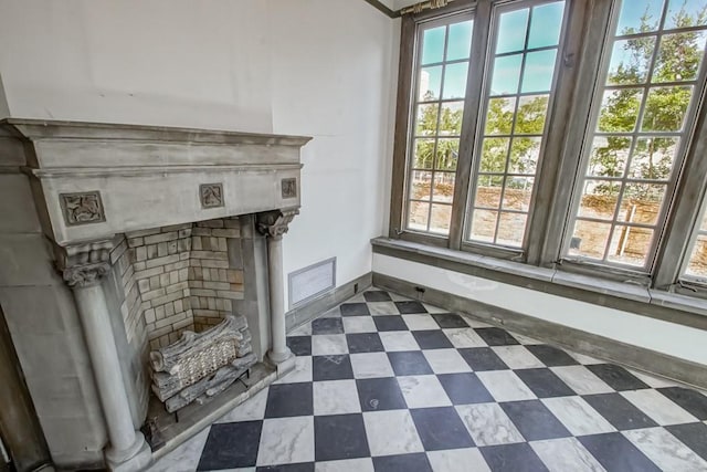 interior details featuring a fireplace