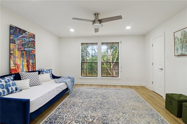 bedroom featuring hardwood / wood-style flooring and ceiling fan