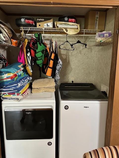 laundry room featuring washing machine and dryer