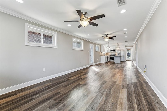 unfurnished living room featuring crown molding, ceiling fan, and dark hardwood / wood-style flooring