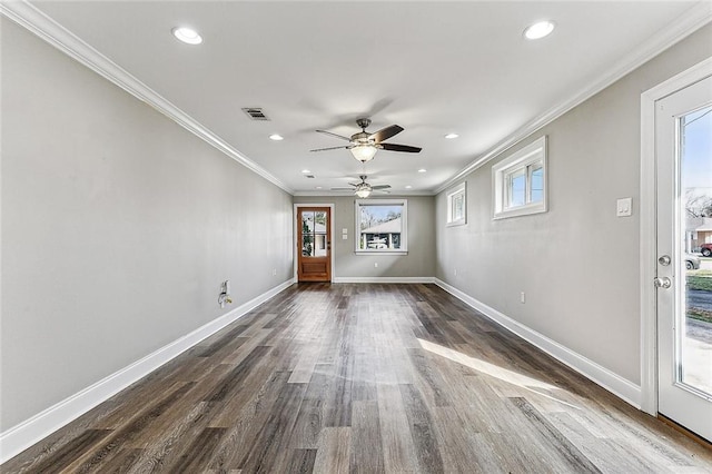 interior space featuring ornamental molding, dark hardwood / wood-style floors, and ceiling fan