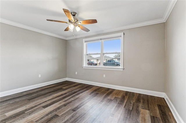 empty room with ceiling fan, ornamental molding, and dark hardwood / wood-style floors