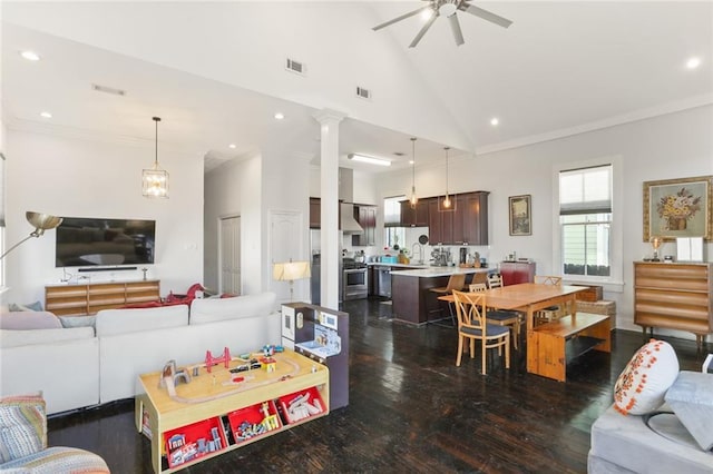 living room featuring ornamental molding, dark wood-type flooring, ceiling fan, and high vaulted ceiling