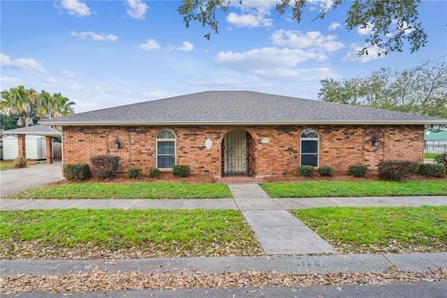 ranch-style home featuring a carport