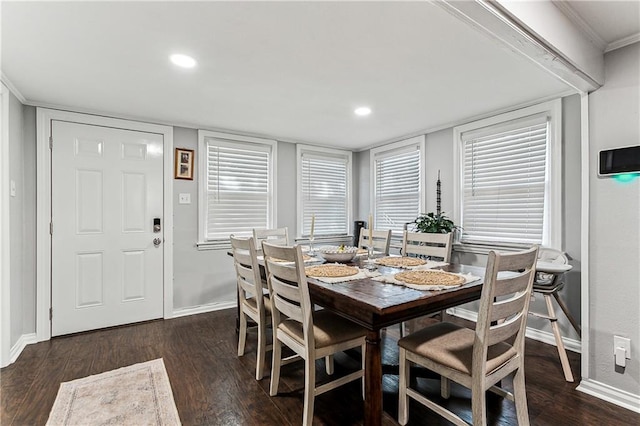 dining area featuring dark hardwood / wood-style flooring