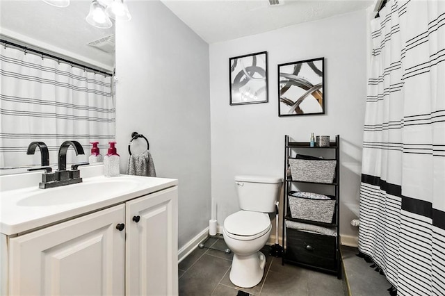 bathroom featuring vanity, a shower with shower curtain, tile patterned floors, and toilet