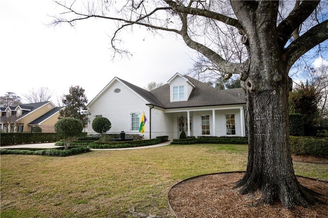 view of front of home featuring a front yard