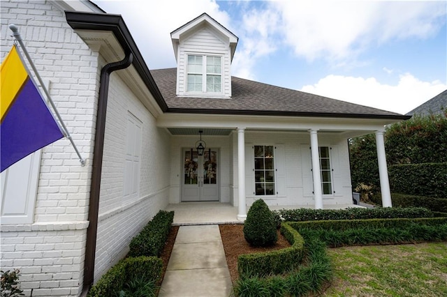 doorway to property with french doors and covered porch