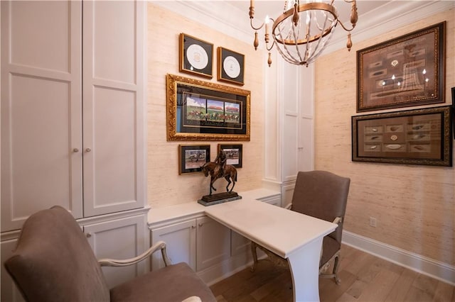 office area with crown molding, a notable chandelier, and light hardwood / wood-style flooring