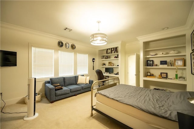 carpeted bedroom featuring ornamental molding and a chandelier