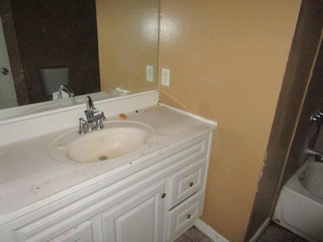 full bathroom featuring shower / tub combination, vanity, and toilet