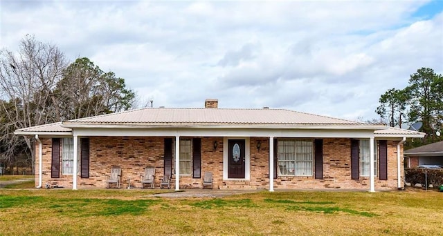 ranch-style house with a front yard