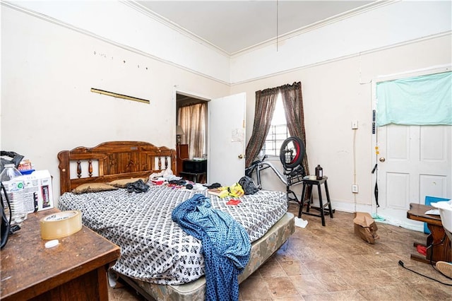 bedroom with crown molding