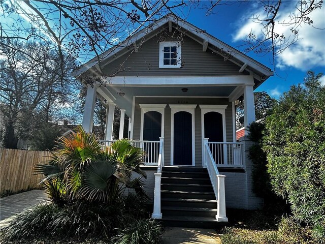 bungalow-style home with a porch