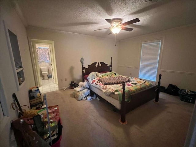 carpeted bedroom with crown molding, ceiling fan, and a textured ceiling