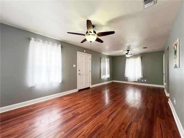 interior space with wood-type flooring and ceiling fan