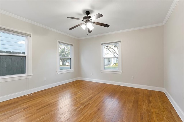 unfurnished room featuring wood-type flooring, ornamental molding, and ceiling fan