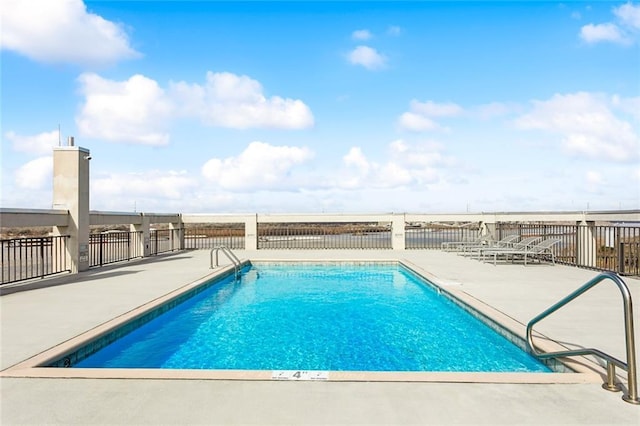 view of pool with a patio area