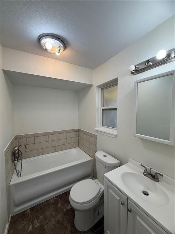 bathroom with a tub to relax in, toilet, and vanity