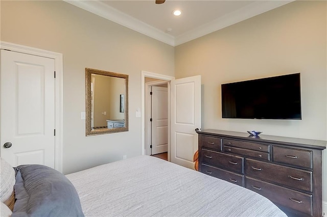 bedroom with ornamental molding