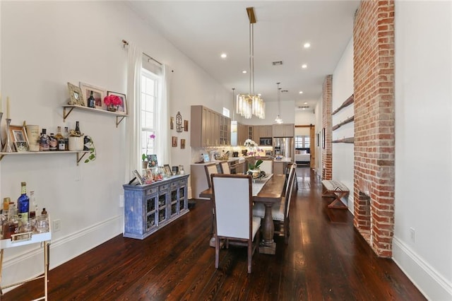 dining room featuring dark wood-type flooring