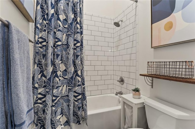 bathroom with shower / tub combo with curtain and toilet