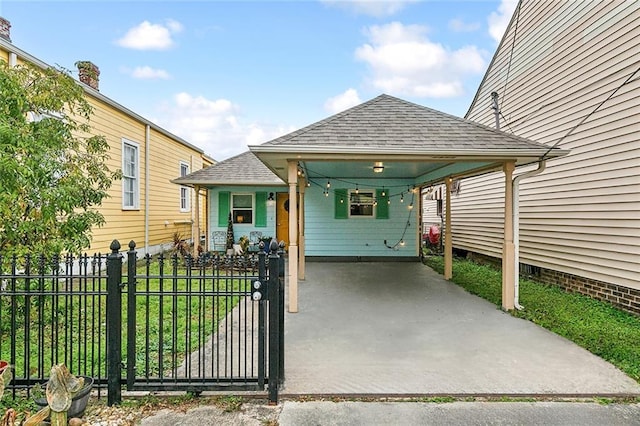 view of front of property with a carport