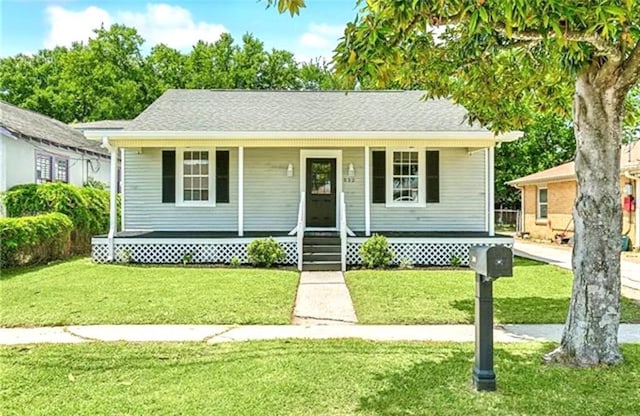 532 Gardere Ave, Harvey, LA 70058 - bungalow with a porch and a front yard