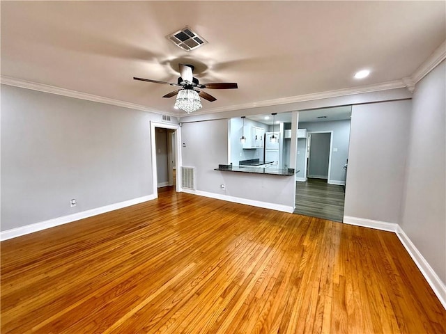532 Gardere Ave, Harvey, LA 70058 - unfurnished living room with ceiling fan, baseboards, wood finished floors, and visible vents