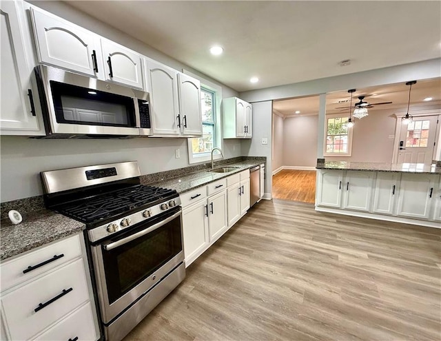 532 Gardere Ave, Harvey, LA 70058 - kitchen with a sink, recessed lighting, light wood-style floors, a ceiling fan, and appliances with stainless steel finishes