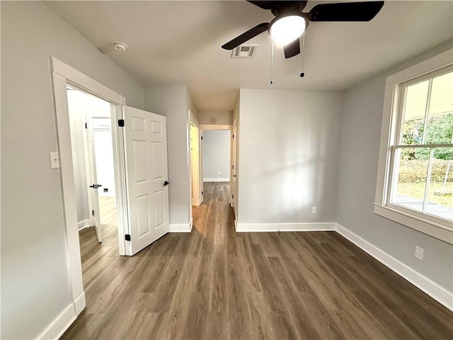 532 Gardere Ave, Harvey, LA 70058 - spare room with a ceiling fan, baseboards, dark wood-style flooring, and visible vents