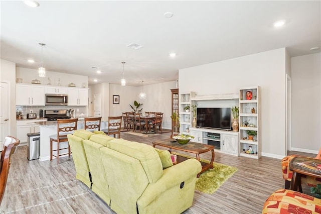 living room with light wood-type flooring