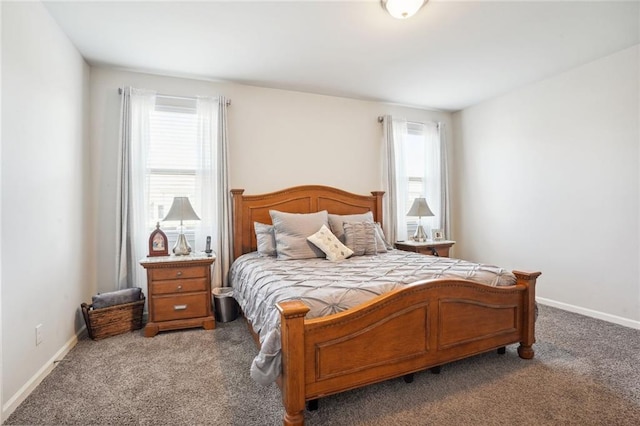 bedroom with carpet flooring and multiple windows