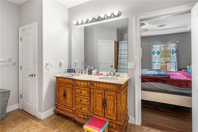 bathroom featuring vanity and tile patterned floors