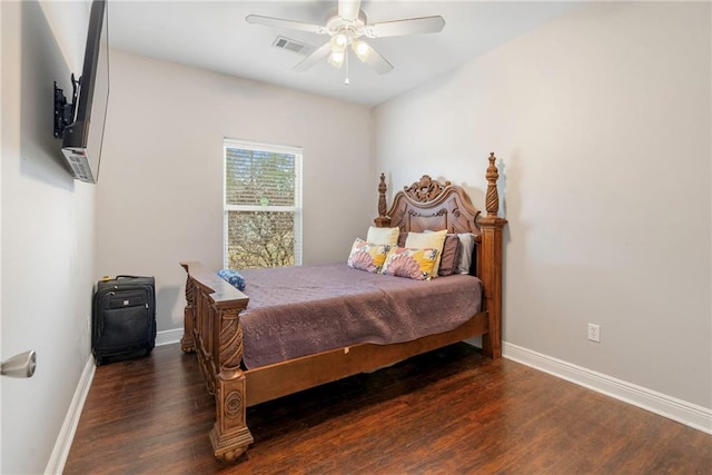 bedroom with ceiling fan and dark hardwood / wood-style flooring