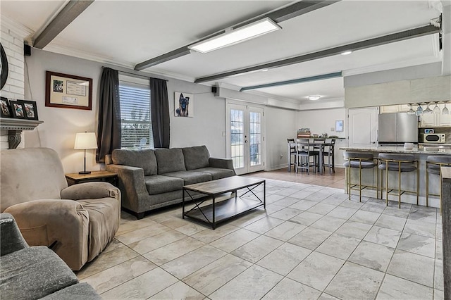 living room with french doors, ornamental molding, and beamed ceiling