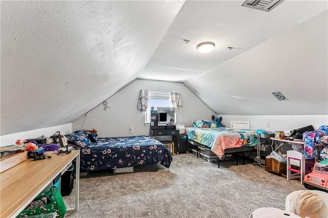 bedroom featuring lofted ceiling, carpet flooring, and a textured ceiling