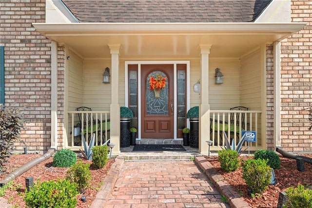 entrance to property with covered porch