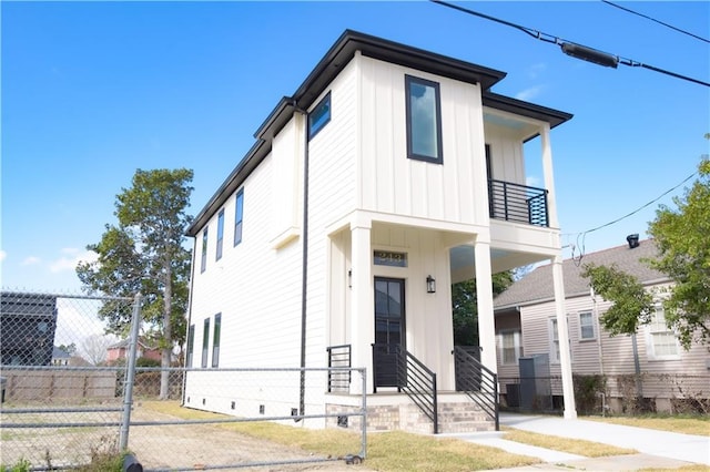 view of front of property with a balcony